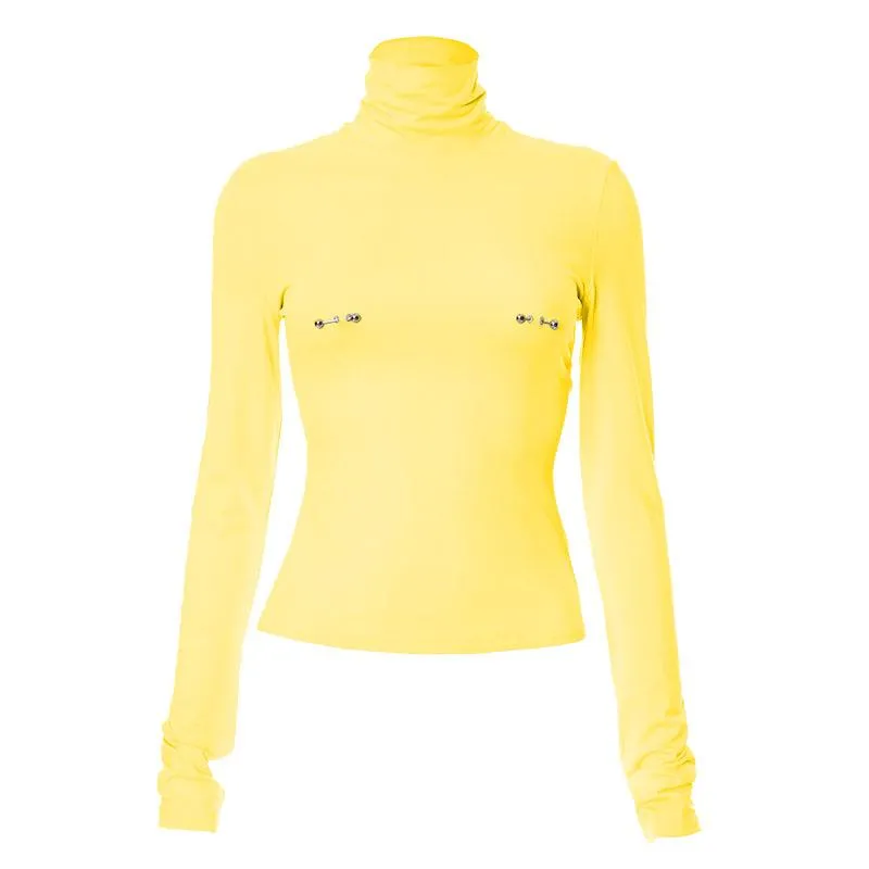 Metal applique turtle neck long sleeve solid top